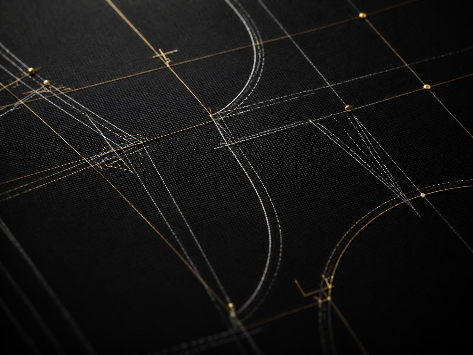 Macro view of a tailoring pattern draft overlaid with a fine gold measurement grid